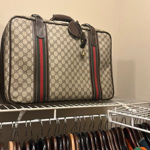 Brand new Gucci monogram suitcase.